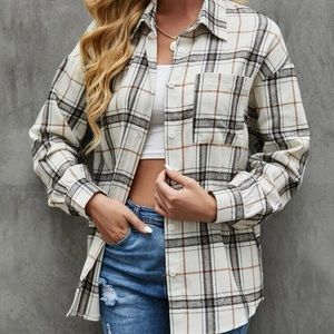 Woman’s plaid button up